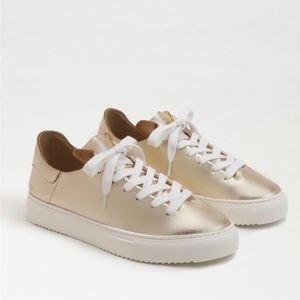 New Balance gold sneakers